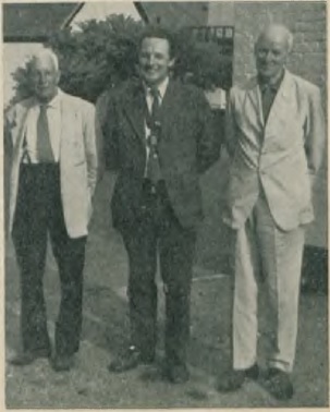 Three people standing